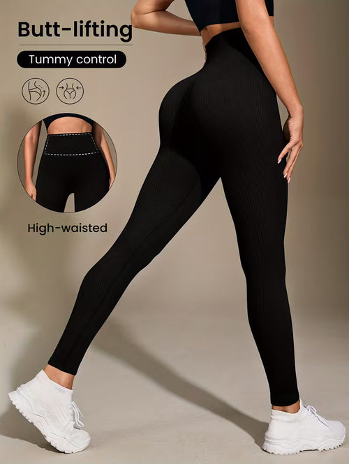 Black leggings with text highlighting features on a beige background